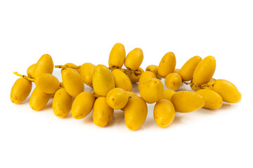 Bunch of yellow raw Date Fruit or Medjool Dates (Phoenix dactylifera) from the palm tree isolated on White Background.Healthy lifestyle and Vegetarian concept