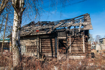 abandoned and burnt-out wooden house