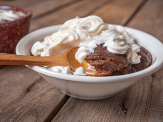 Latvian bread soup made from rye rusks with whipped cream in a deep plate