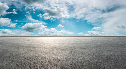 Asphalt race track road and sky clouds.Road ground background.
