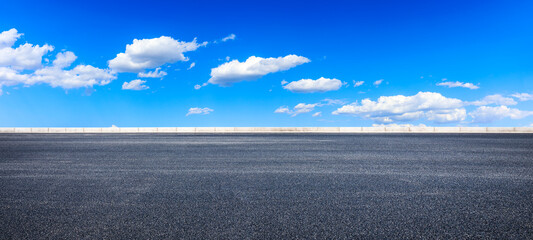 Empty asphalt road and blue sky with white clouds.Road background.