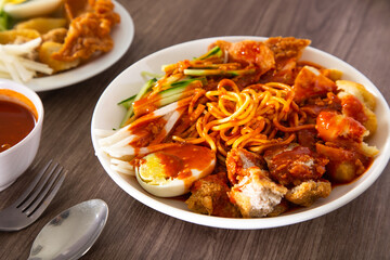 Mee Rojak is Malaysia Indian food of noodle with peanut sauce.