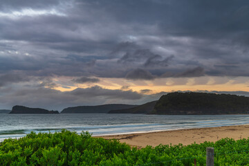 Obraz premium Overcast Summer Sunrise at the Beach