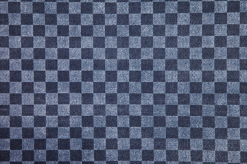Blue and gray checkered fabric close up. Squared pattern geometric background. Copy space for site...