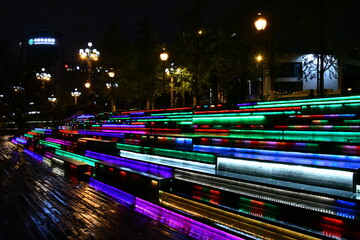 Steps to a riverbank with lights at night, Guilin, China
