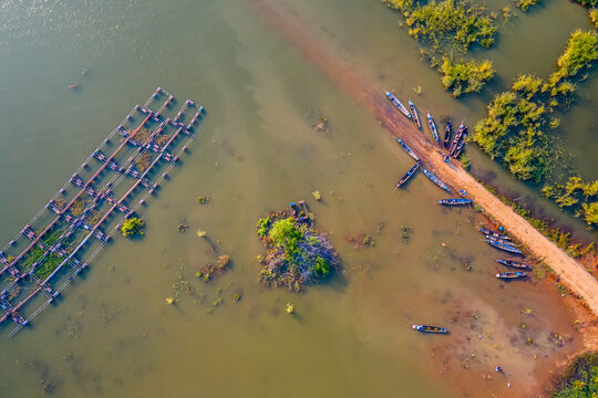 Aerial view Drone top view of Longtail fishing boats in the river.