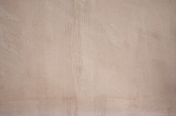 Abstract modern beige concrete wall texture backdrop for backgrounds and design for text.