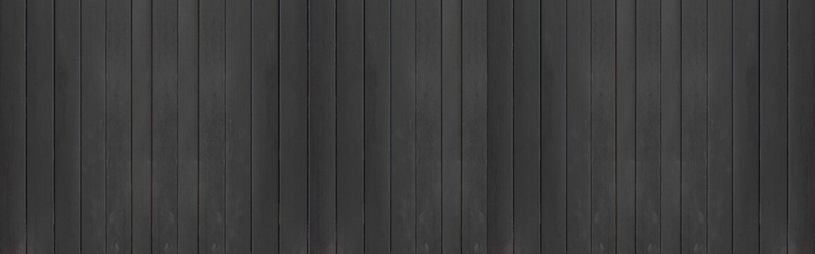 Panorama of Black painted wooden slats texture and seamless background