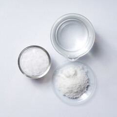 Cosmetic chemicals ingredient on laboratory table. Microcrystalline wax, Potassium chloride (KCl).