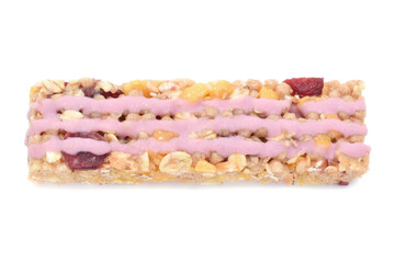 Cereal bar with dried cranberries, almonds and oat flakes closed up isolated on white