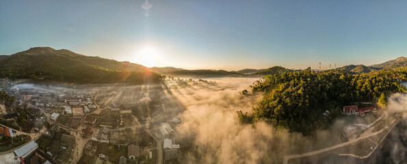 Panorama, Beautiful aerial high angle drone view of Ban Rak Thai Village in sunrise, a Village of Chinese settlement in Mae Hong Son province, Northern Thailand