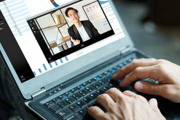 Video chat. Online education. Distance learning. Business webinar. Man using laptop with charts...