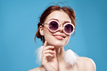 beautiful woman naked shoulders fluffy earrings sunglasses accessories makeup