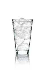 Glass of mineral carbonated water with ice cubes. isolated on white background