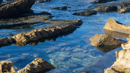  image water under rocks HD in the sea