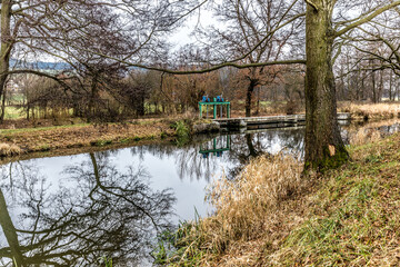 Massive and well fortified medieval Water Castle of Svihov is situated in the Pilsen Region, Czech Republic, Europe. There are water canal around the stone castle. Winter view.