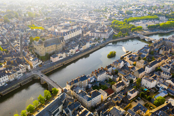 Fototapeta premium Scenic aerial view of old town of French city of Laval at sunny summer day