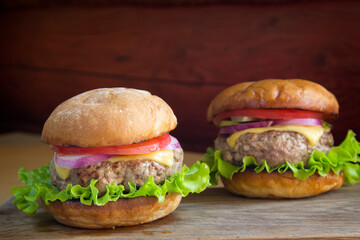 Homemade burger with meat patty and vegetables
