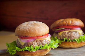 Homemade burger with meat patty and vegetables