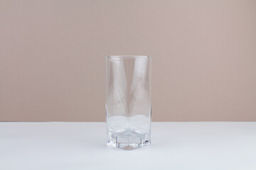 glass cup on white brown background stylish in the kitchen