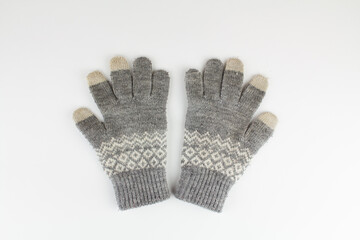 women's winter knitted mittens on a white background