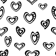 Seamless vector pattern. Stylized black and white hearts on a transparent background.