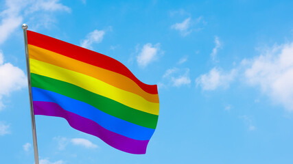 LGBT flag on pole.