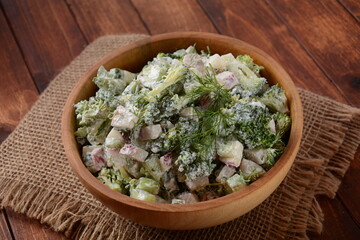 Salad with broccoli and radish. Rustic style