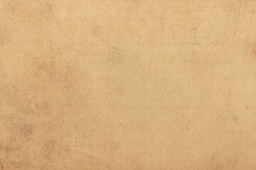 The surface of the old worn faded cardboard is stained.