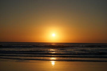 Beautiful sunset landscape of Nusa Dua Beach at dusk, Bali island, Indonesia