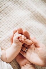 baby hands and fingers close up on white background
