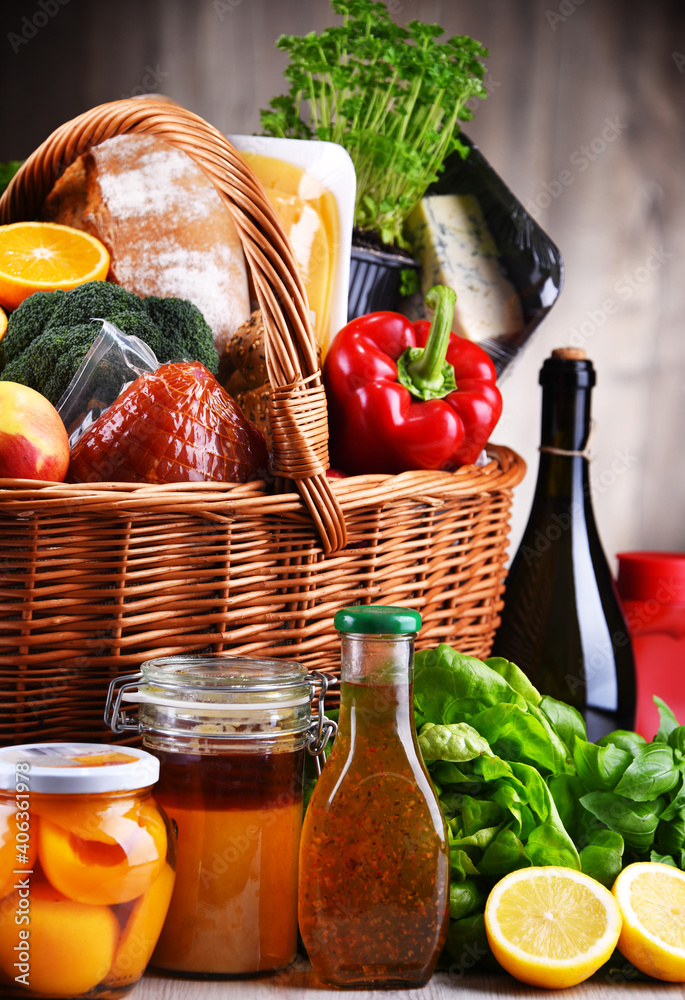 Poster wicker basket with assorted grocery products