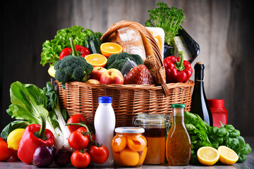 Wicker basket with assorted grocery products
