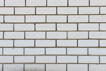 Brick wall made of white silicate brick with mortar spots