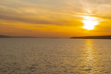Beautiful evening sunset over a wide river