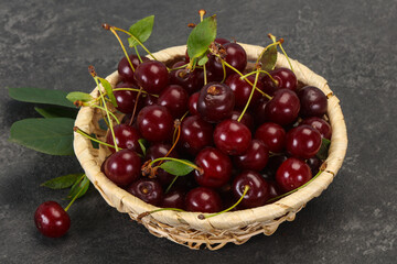 Sweet ripe cherry with leaves