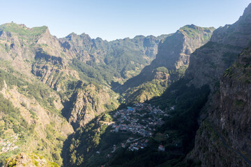 Fototapeta na wymiar Viewpoint Eira do Serrado looking to Curral das Freiras Village in the Nuns Valley in beautiful mountain scenery, Madeira Island