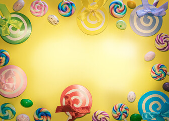 birthday background, bright yellow background with candies lollipops, sweets