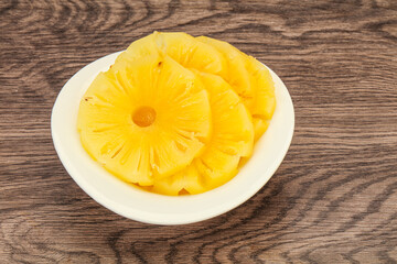 Marinated pineapple rings in the bowl