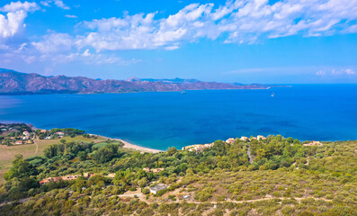Panoramic aerial view of the Corsican coast with a mountain village near the capital Ajaccio. Corsica, France. Tourism and vacations concept.