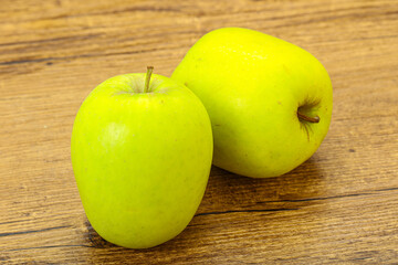 Two ripe green sweet apples