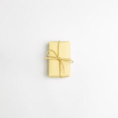 Yellow gift box isolated on white background. top view, copy space