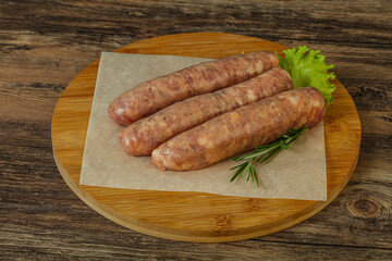 Raw pork meat sausages for grill