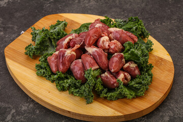 Fototapeta premium Raw chicken hearts for cooking