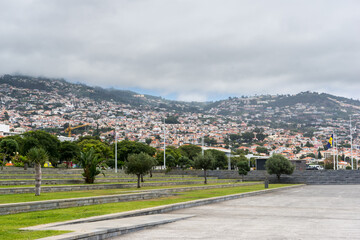 Funchal suburbs on mountain cliffs on a cloudy day, Madeira Island