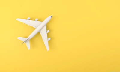 Flat lay design of travel concept with plane on yellow background with copy space.
