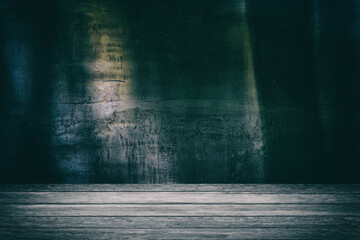 Wooden Table with Spotlight at the Center and Old Grunge Concrete Wall in Dark Tone with Grain,...