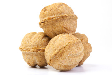 Traditional Russian nuts with condensed milk isolated on a white background. Nut cakes for New Year's holidays.