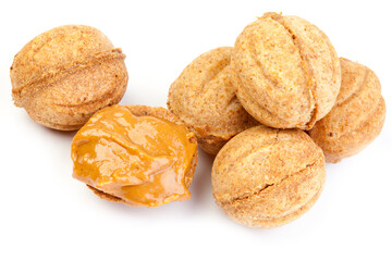 Traditional Russian nuts with condensed milk isolated on a white background. Nut cakes for New Year's holidays.