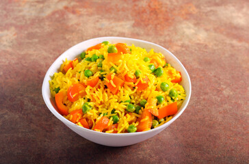 Rice with carrot, pepper and pea